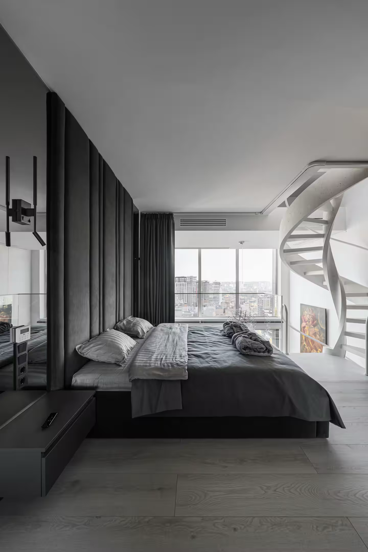 Luxury apartment bedroom with panoramic city view in Kyiv